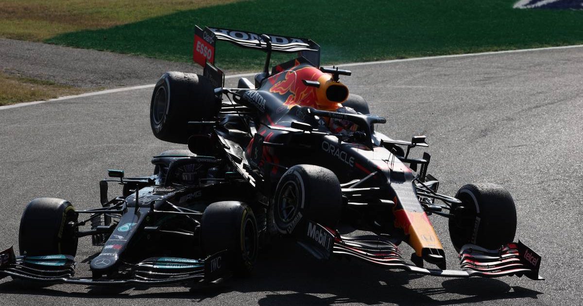 a photo of max and lewis' collision in monza